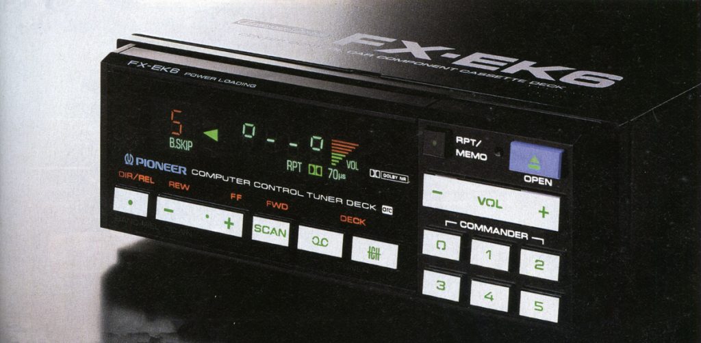 Vintage Pioneer FX-EK6 computer control tuner deck with digital display, buttons for rewind, fast forward, scan, and more.