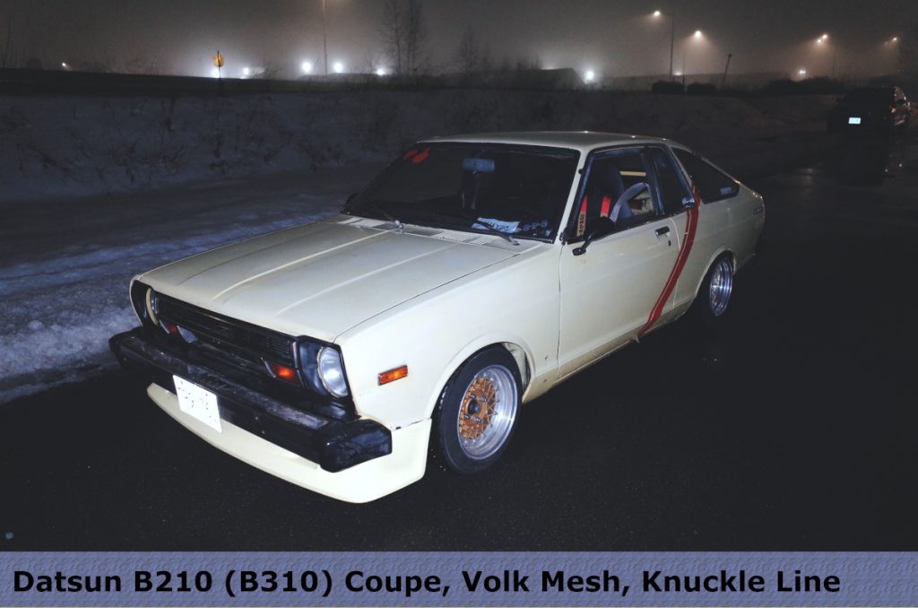 Classic Datsun B210 (B310) Coupe, tuned with Volk Mesh wheels, parked on a misty night street for Knuckle Line shoot