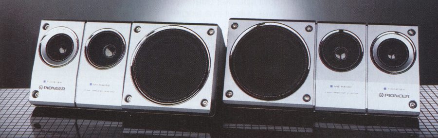 Pioneer stereo speakers set with multiple drivers on mesh grid background displaying brand logo and text in Japanese.