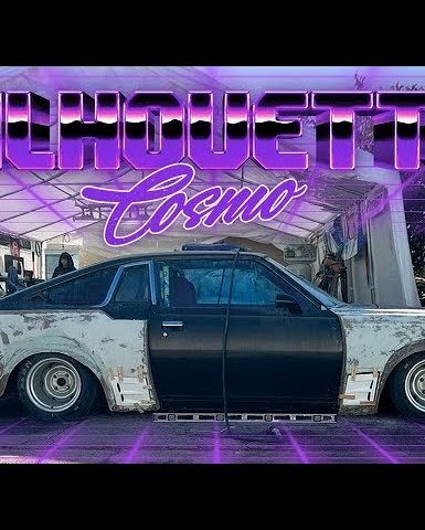 Modified classic car under a canopy with neon text Silhouette Cosmo above, highlighting custom automotive restoration.