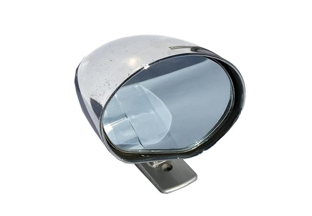 Vintage chrome car side mirror with blue-tinted glass reflecting light.