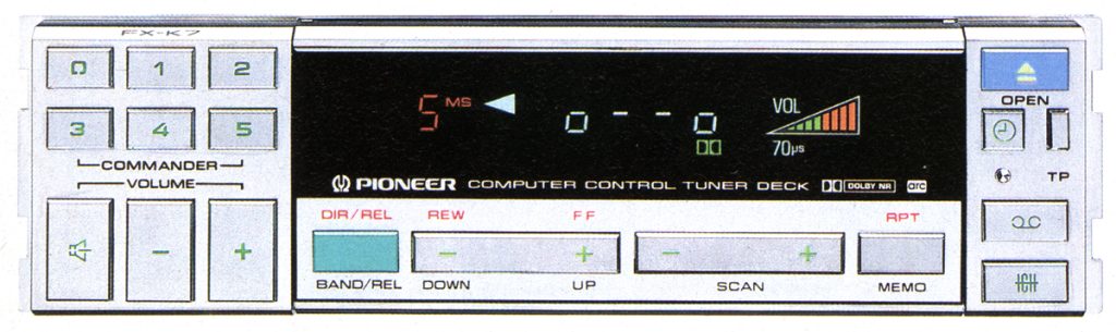 Vintage Pioneer FX-K7 tuner deck with digital display, volume control, and multiple buttons for functions like rewind, scan, and memory.
