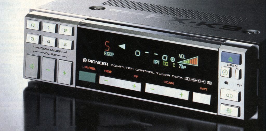 Vintage Pioneer FX-K9 computer control tuner deck with digital display and control buttons on a gray casing.